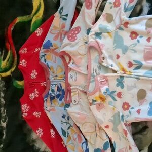 Four Carter's footies PJs size 18 month